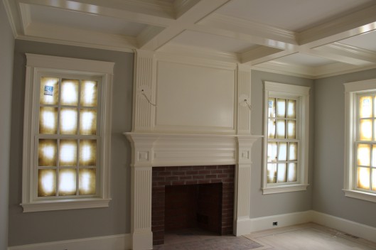 Image of Fireplace mantle with coffered ceiliing