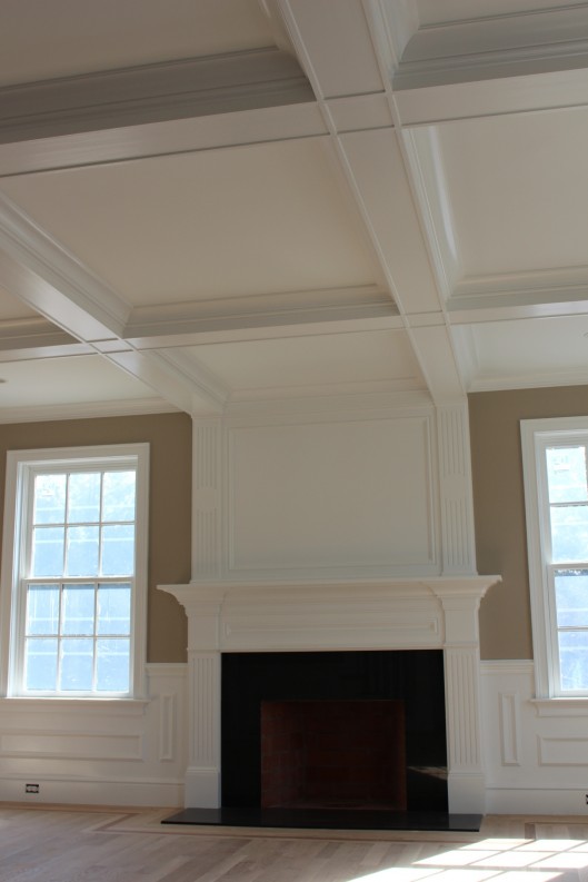 Image of Fireplace Mantle and Coffered Ceiling